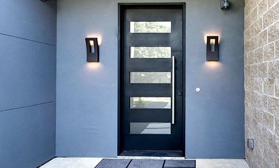 Custom installed and designed iron door and lighting