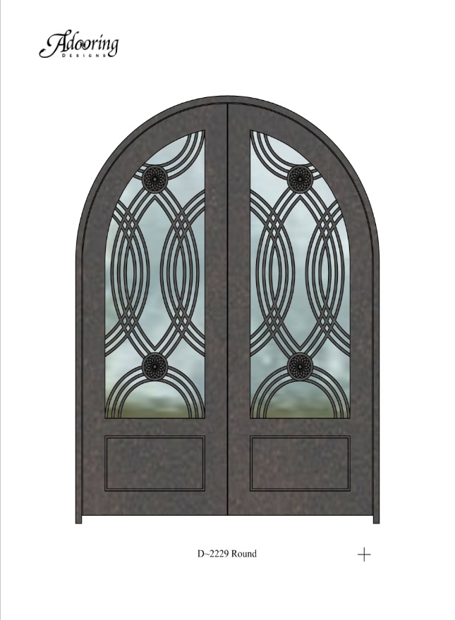 Round top iron double doors with ornate decorative ironwork over windows