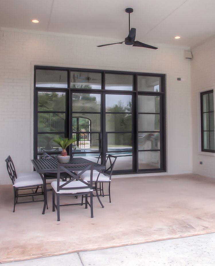 Black finish iron double door onto the patio