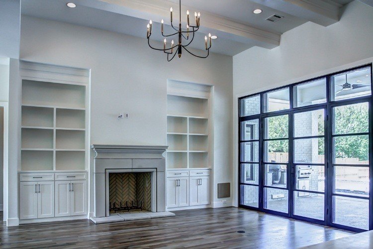 Large square  top iron doors looking onto patio