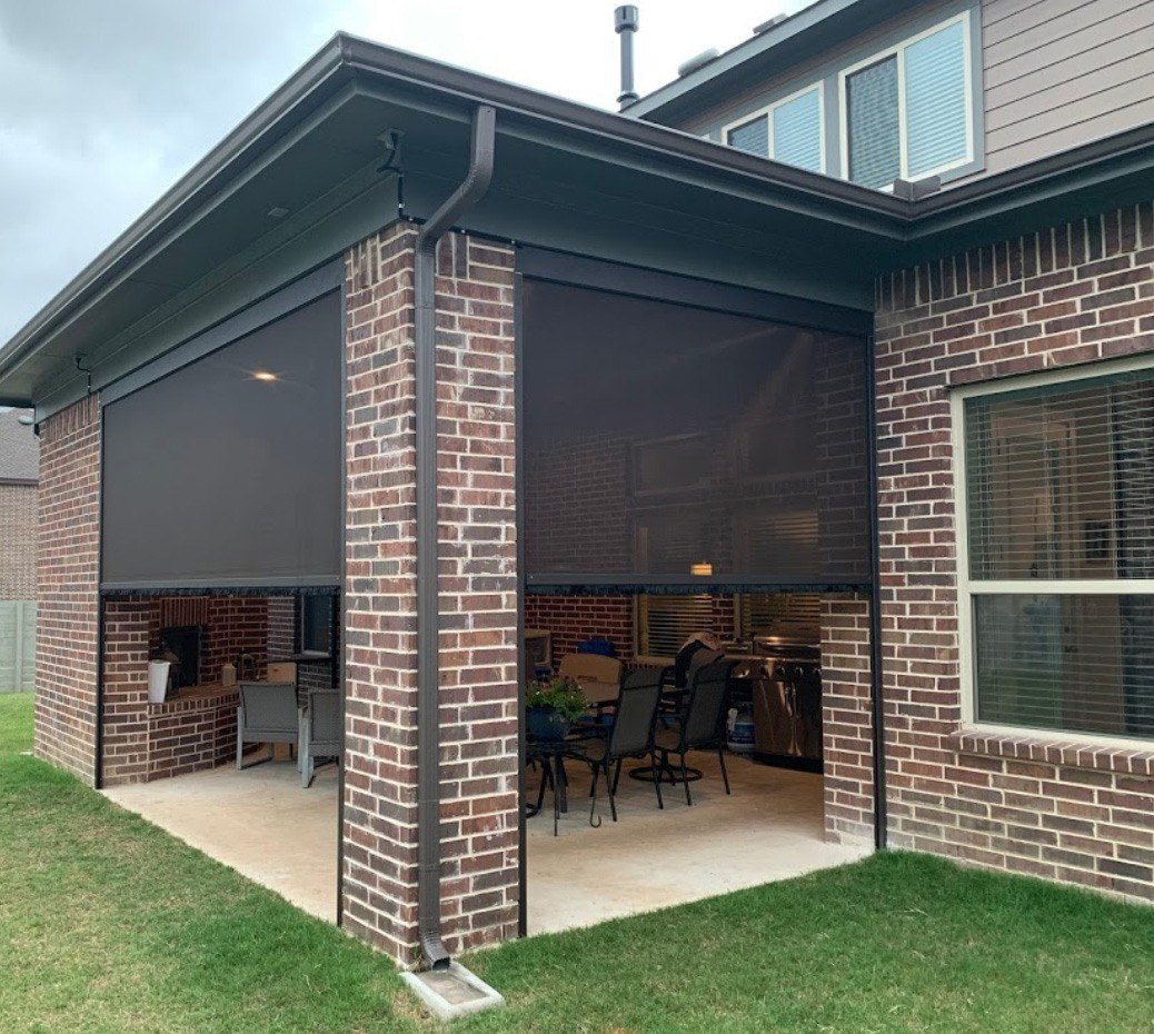 Looking into patio area as motorized shades are lifted