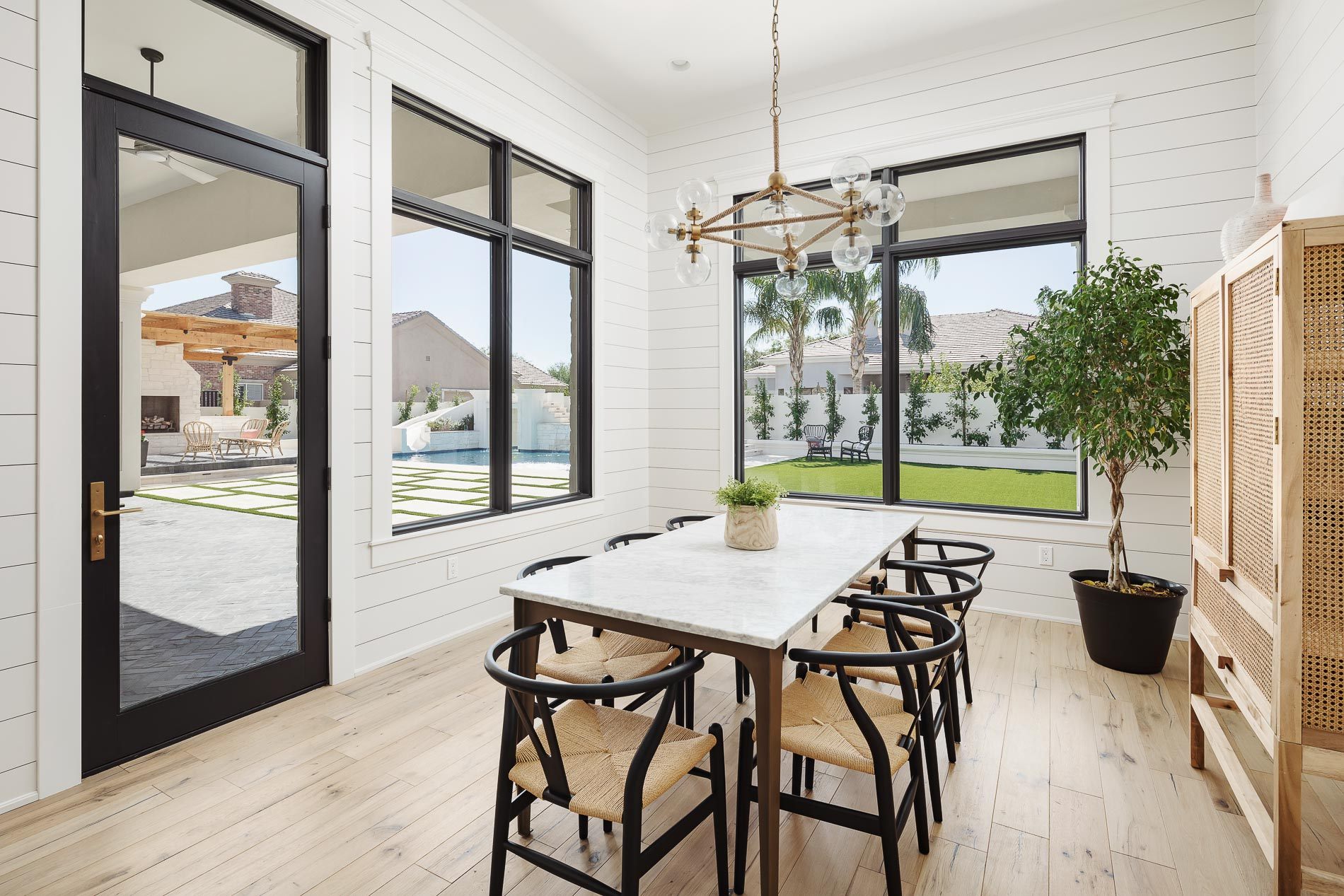 Bright airy dining room with new replacement windows